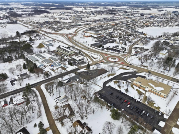 06_aerial_town_overview_east.webp