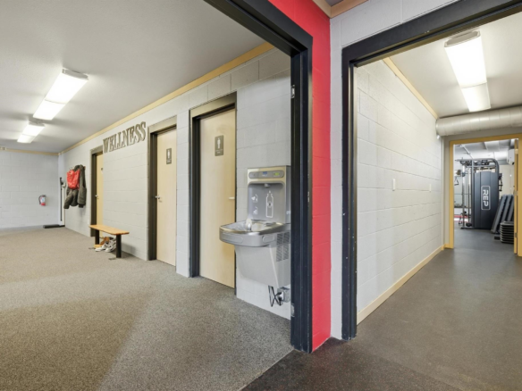 28_lower_level_wellness_corridor.webp